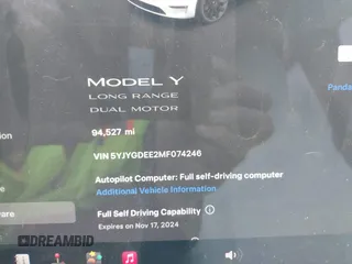 2021 Tesla Model Y Long Range with VIN 5YJYGDEE2MF074246, listed as a IAAI auction lot 40456971 with 94,527 mi miles. Bid and sale history available at carsss.com. Image 7.
