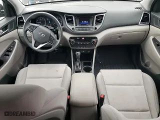 2018 Hyundai Tucson SE with VIN KM8J23A45JU698516, listed as a Copart auction lot 49079215 with 57,609 mi miles and Salvage Title. Bid and sale history available at carsss.com. Image 8.