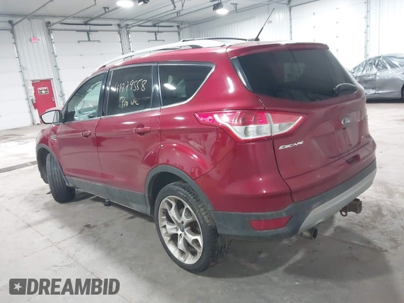 2013 Ford Escape Titanium with VIN 1FMCU9J98DUA72061, listed as a IAAI auction lot 41979558 with 176,667 mi miles and . Bid and sale history available at DreamBid. Image 3.