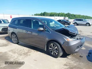 2016 Honda Odyssey Touring Elite z VIN 5FNRL5H91GB037942, wystawiony jako IAAI lot #42318193 z przebiegiem Nie podano mil oraz . Historia ofert i sprzedaży dostępna na DreamBid. Obrazek 1.