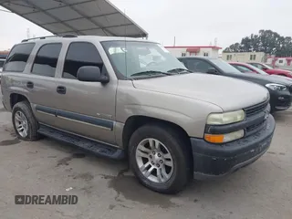 2003 Chevrolet Tahoe LS z VIN 1GNEC13VX3R280897, wystawiony jako IAAI lot #42160188 z przebiegiem 208 742 mil mil oraz . Historia ofert i sprzedaży dostępna na DreamBid. Obrazek 1.