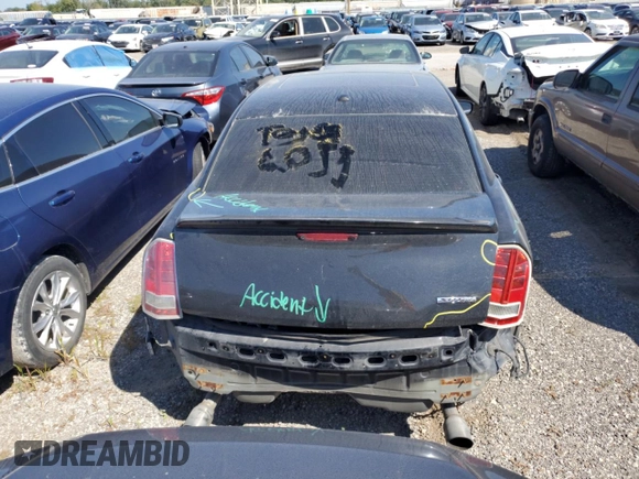 2013 Chrysler 300 SRT-8 with VIN 2C3CCAFJ9DH731557, listed as a Copart auction lot 69700344 with 174,242 mi miles and Salvage Title. Bid and sale history available at DreamBid. Image 6.