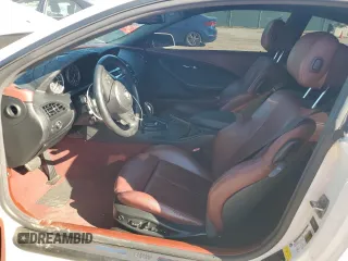2010 BMW 6 Series 650i with VIN WBAEA5C52ACV92831, listed as a Copart auction lot 73397574 with 111,104 mi miles and Salvage Title. Bid and sale history available at carsss.com. Image 7.
