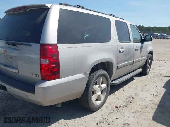 2007 Chevrolet Suburban LS with VIN 1GNFC16087J239886, listed as a IAAI auction lot 41874548 with 303,014 mi miles and . Bid and sale history available at DreamBid. Image 4.