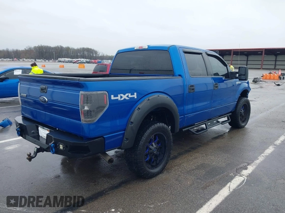 2014 Ford F-150 XL with VIN 1FTFW1EF6EKD75835, listed as a IAAI auction lot 41942390 with 130,939 mi miles. Bid and sale history available at carsss.com. Image 4.