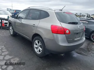 2009 Nissan Rogue SL with VIN JN8AS58T89W061346, listed as a IAAI auction lot 41772866 with 184,571 mi miles and . Bid and sale history available at DreamBid. Image 3.