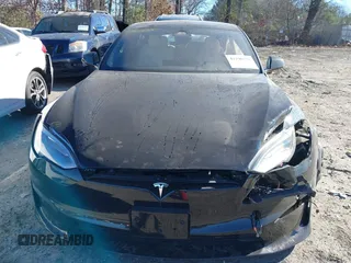 2021 Tesla Model S Long Range z VIN 5YJSA1E50MF438864, wystawiony jako IAAI lot #41190778 z przebiegiem Nie podano mil oraz . Historia ofert i sprzedaży dostępna na DreamBid. Obrazek 13.