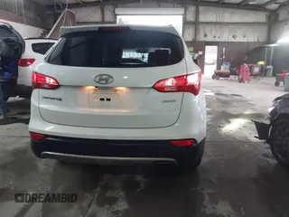 2014 Hyundai Santa Fe Sport with VIN 5XYZU3LB9EG140446, listed as a IAAI auction lot 41527693 with 129,610 mi miles. Bid and sale history available at carsss.com. Image 16.
