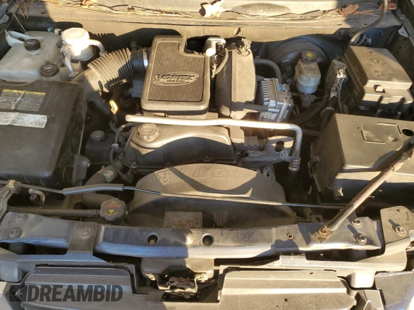 2005 GMC Envoy SLT with VIN 1GKDS13S652339845, listed as a Copart auction lot 77693684 with 220,306 mi miles and Salvage Title. Bid and sale history available at carsss.com. Image 12.