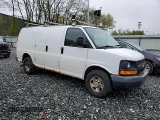 2013 Chevrolet Express Cargo z VIN 1GCWGFFA7D1103926, wystawiony jako Copart lot #55557045 z przebiegiem 284 824 mil mil oraz Tytuł czysty. Historia ofert i sprzedaży dostępna na DreamBid. Obrazek 4.