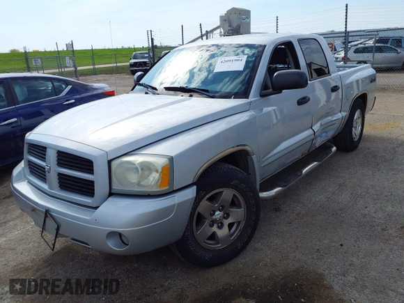 2006 Dodge Dakota SLT z VIN 1D7HW48N76S645515, wystawiony jako IAAI lot #42091904 z przebiegiem 160 695 mil mil oraz . Historia ofert i sprzedaży dostępna na DreamBid. Obrazek 2.