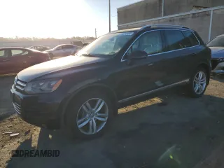 2012 Volkswagen Touareg Sport with VIN WVGEF9BP9CD006844, listed as a Copart auction lot 43216485 with 120,059 mi miles and Salvage Title. Bid and sale history available at DreamBid. Image 1.