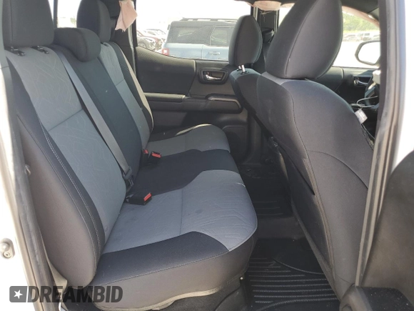 2023 Toyota Tacoma SR z VIN 3TMCZ5AN8PM589655, wystawiony jako Copart lot #56663615 z przebiegiem 43 327 mil mil oraz Szkoda całkowita • Salvage title. Historia ofert i sprzedaży dostępna na DreamBid. Obrazek 10.