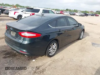 2014 Ford Fusion SE with VIN 3FA6P0HD3ER184294, listed as a IAAI auction lot 42141660 with 216,696 mi miles. Bid and sale history available at carsss.com. Image 4.