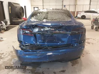 2021 Tesla Model S Plaid with VIN 5YJSA1E6XMF439884, listed as a IAAI auction lot 41622750 with Not provided miles and . Bid and sale history available at DreamBid. Image 16.