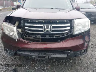 2015 Honda Pilot EX-L with VIN 5FNYF4H55FB033031, listed as a IAAI auction lot 41979525 with 150,690 mi miles and . Bid and sale history available at carsss.com. Image 6.