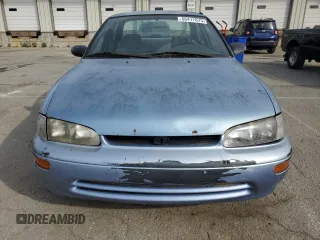 1996 Geo Prizm LSi z VIN 1Y1SK5262TZ041811, wystawiony jako Copart lot #56417875 z przebiegiem 185 771 mil mil oraz Tytuł czysty. Historia ofert i sprzedaży dostępna na DreamBid. Obrazek 5.