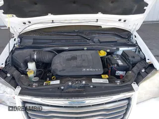 2014 Chrysler Town & Country Touring-L with VIN 2C4RC1CG2ER312444, listed as a IAAI auction lot 42050774 with 124,010 mi miles. Bid and sale history available at carsss.com. Image 10.
