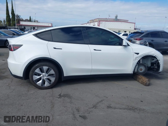 2023 Tesla Model Y Long Range with VIN 7SAYGDEE9PA094191, listed as a IAAI auction lot 41906319 with 15,240 mi miles and . Bid and sale history available at DreamBid. Image 14.