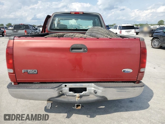 2004 Ford F-150 XL with VIN 2FTRX17W64CA79272, listed as a Copart auction lot 59186965 with 170,512 mi miles and Salvage title. Bid and sale history available at DreamBid. Image 6.