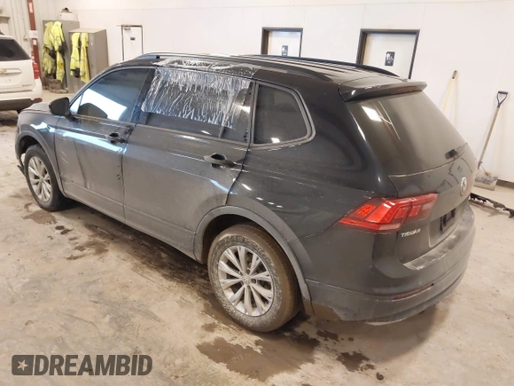 2019 Volkswagen Tiguan S with VIN 3VV0B7AX3KM182311, listed as a IAAI auction lot 41727114 with 98,035 mi miles and . Bid and sale history available at DreamBid. Image 3.