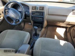 1997 Mazda Protege DX z VIN JM1BC1412V0157268, wystawiony jako Copart lot #61380564 z przebiegiem 85 356 mil mil oraz Szkoda całkowita • Salvage title. Historia ofert i sprzedaży dostępna na DreamBid. Obrazek 8.