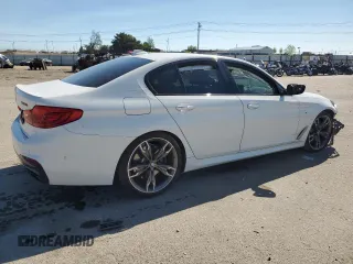 2018 BMW 5 Series M550i xDrive with VIN WBAJB9C51JB287233, listed as a Copart auction lot 55899505 with Not provided miles and Salvage title. Bid and sale history available at DreamBid. Image 3.