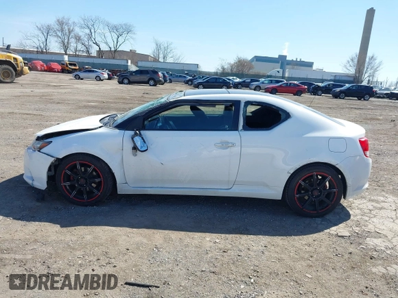 2012 Scion tC with VIN JTKJF5C7XC3029980, listed as a IAAI auction lot 41832490 with 132,140 mi miles. Bid and sale history available at carsss.com. Image 15.
