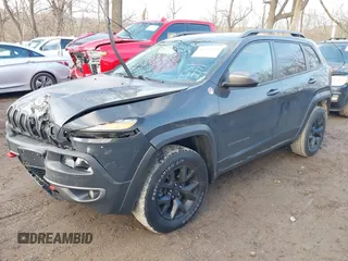 2017 Jeep Cherokee Trailhawk with VIN 1C4PJMBS4HW647852, listed as a IAAI auction lot 41192324 with 116,429 mi miles and . Bid and sale history available at DreamBid. Image 2.