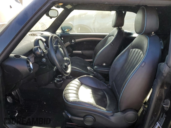 2014 MINI Convertible S with VIN WMWZP3C55ET298172, listed as a Copart auction lot 76977114 with 119,138 mi miles and Salvage title. Bid and sale history available at DreamBid. Image 7.