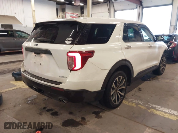 2022 Ford Explorer ST-Line with VIN 1FMSK8KHXNGB57162, listed as a IAAI auction lot 41491271 with 57,712 mi miles. Bid and sale history available at carsss.com. Image 4.