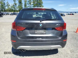 2013 BMW X1 xDrive28i z VIN WBAVL1C5XDVR89392, wystawiony jako Copart lot #55699185 z przebiegiem 127 856 mil mil oraz Czysty tytuł • Clean title. Historia ofert i sprzedaży dostępna na DreamBid. Obrazek 6.