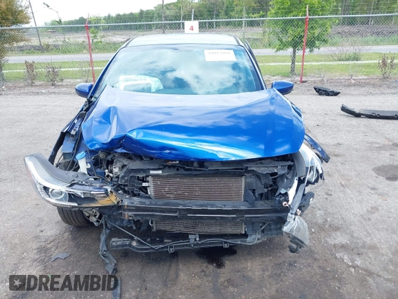 2018 Kia Forte LX with VIN 3KPFL4A77JE281839, listed as a IAAI auction lot 42012006 with 134,675 mi miles and . Bid and sale history available at DreamBid. Image 12.