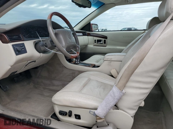 2001 Cadillac Eldorado ESC z VIN 1G6EL12Y11B103541, wystawiony jako Copart lot #45219055 z przebiegiem 46 179 mil mil oraz Tytuł czysty. Historia ofert i sprzedaży dostępna na DreamBid. Obrazek 7.
