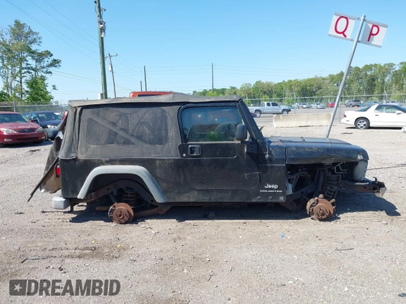 2005 Jeep Wrangler Unlimited with VIN 1J4FA44S25P385421, listed as a IAAI auction lot 42039381 with 1 mi miles. Bid and sale history available at carsss.com. Image 12.