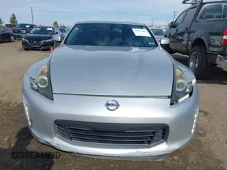 2018 Nissan 370Z Sport with VIN JN1AZ4EH7JM572602, listed as a IAAI auction lot 41902662 with 76,262 mi miles and . Bid and sale history available at DreamBid. Image 12.