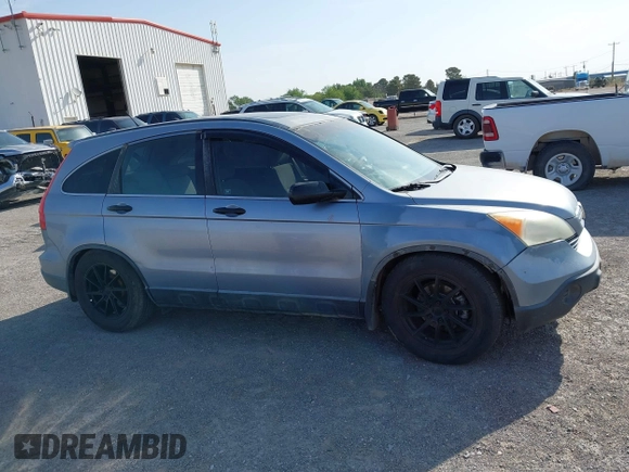 2009 Honda CR-V EX with VIN JHLRE38599C004833, listed as a IAAI auction lot 41982725 with 212,280 mi miles and . Bid and sale history available at carsss.com. Image 13.