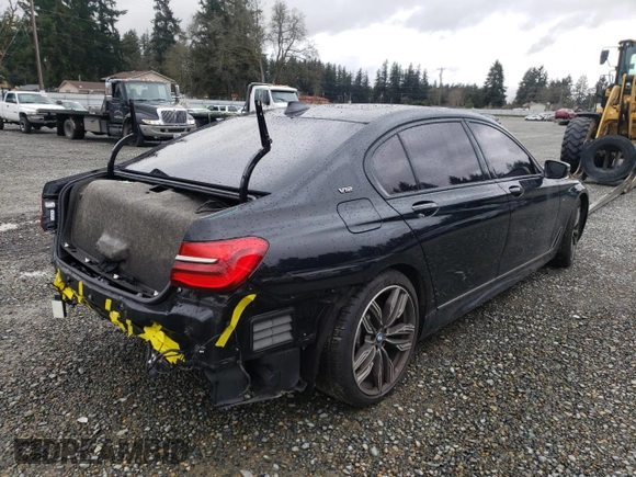 2018 BMW 7 Series M760i xDrive with VIN WBA7H6C55JG614811, listed as a Copart auction lot 44707433 with 27,542 mi miles. Bid and sale history available at carsss.com. Image 3.