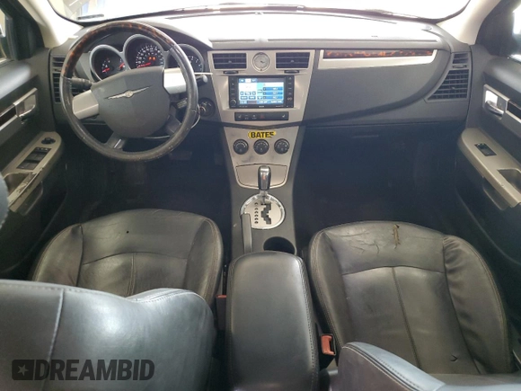 2010 Chrysler Sebring Limited with VIN 1C3CC5FB2AN229671, listed as a Copart auction lot 62181015 with 229,390 mi miles and Salvage title. Bid and sale history available at DreamBid. Image 8.