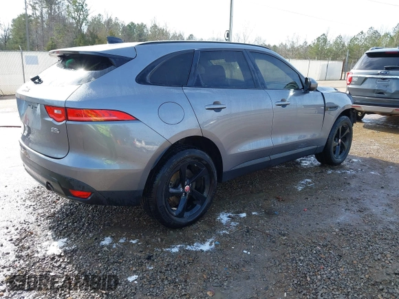 2020 Jaguar F-Pace 25t Premium with VIN SADCJ2FX7LA630157, listed as a IAAI auction lot 41410660 with 58,972 mi miles and . Bid and sale history available at DreamBid. Image 4.