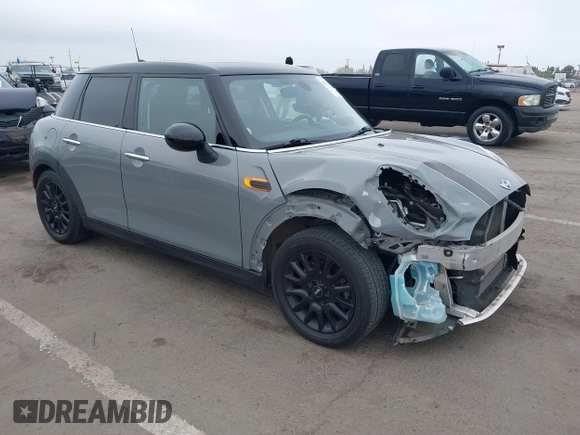 2015 MINI Hardtop 4 Door with VIN WMWXS5C52FT829699, listed as a IAAI auction lot 42078187 with 59,641 mi miles and . Bid and sale history available at DreamBid. Image 1.
