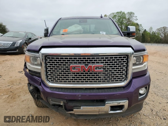 2017 GMC Sierra 2500HD Denali z VIN 1GT12UEG4HF127967, wystawiony jako Copart lot #51812665 z przebiegiem Nie podano mil oraz Szkoda całkowita • Salvage title. Historia ofert i sprzedaży dostępna na DreamBid. Obrazek 5.