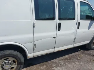 2012 Chevrolet Express Cargo Van with VIN 1GCWGFCA6C1147841, listed as a IAAI auction lot 42042056 with 248,374 mi miles. Bid and sale history available at carsss.com. Image 6.