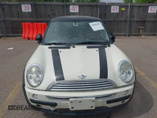 2004 MINI Hardtop with VIN WMWRC334X4TJ56384, listed as a IAAI auction lot 42581423 with 79,129 mi miles and . Bid and sale history available at DreamBid. Image 6.