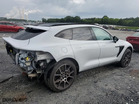 2021 Aston Martin DBX with VIN SCFVUJAW8MTV01405, listed as a Copart auction lot 56564704 with 12,386 mi miles and Salvage Title. Bid and sale history available at carsss.com. Image 3.