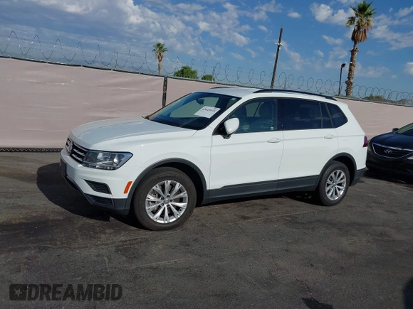 2020 Volkswagen Tiguan S with VIN 3VV1B7AXXLM036994, listed as a IAAI auction lot 42643035 with 62,676 mi miles and . Bid and sale history available at DreamBid. Image 14.