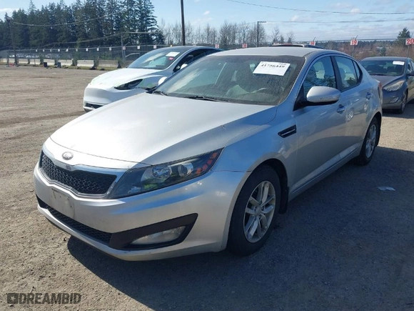 2013 Kia Optima LX with VIN KNAGM4A74D5371383, listed as a IAAI auction lot 41756449 with 133,002 mi miles. Bid and sale history available at carsss.com. Image 2.