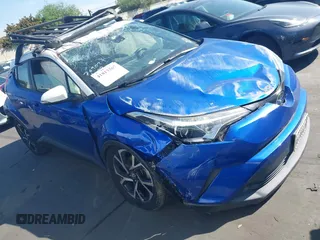 2019 Toyota C-HR XLE with VIN JTNKHMBX5K1043079, listed as a IAAI auction lot 41813367 with 77,879 mi miles and . Bid and sale history available at DreamBid. Image 1.