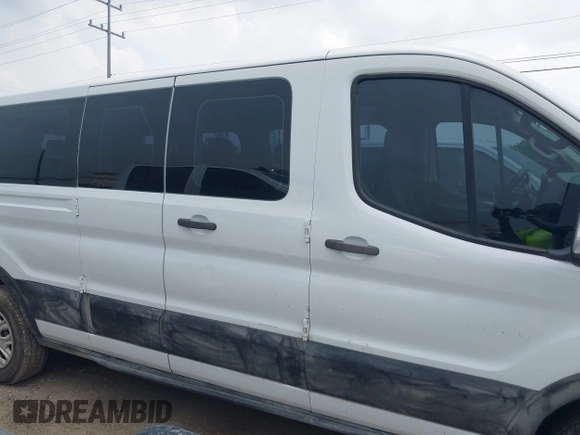 2021 Ford Transit Passenger XL with VIN 1FBAX2Y88MKA13051, listed as a IAAI auction lot 42173862 with 73,507 mi miles. Bid and sale history available at carsss.com. Image 14.