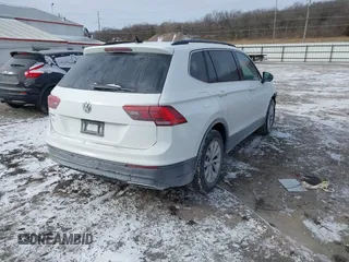 2019 Volkswagen Tiguan SE with VIN 3VV3B7AX7KM040136, listed as a IAAI auction lot 41397714 with 82,302 mi miles and . Bid and sale history available at DreamBid. Image 4.